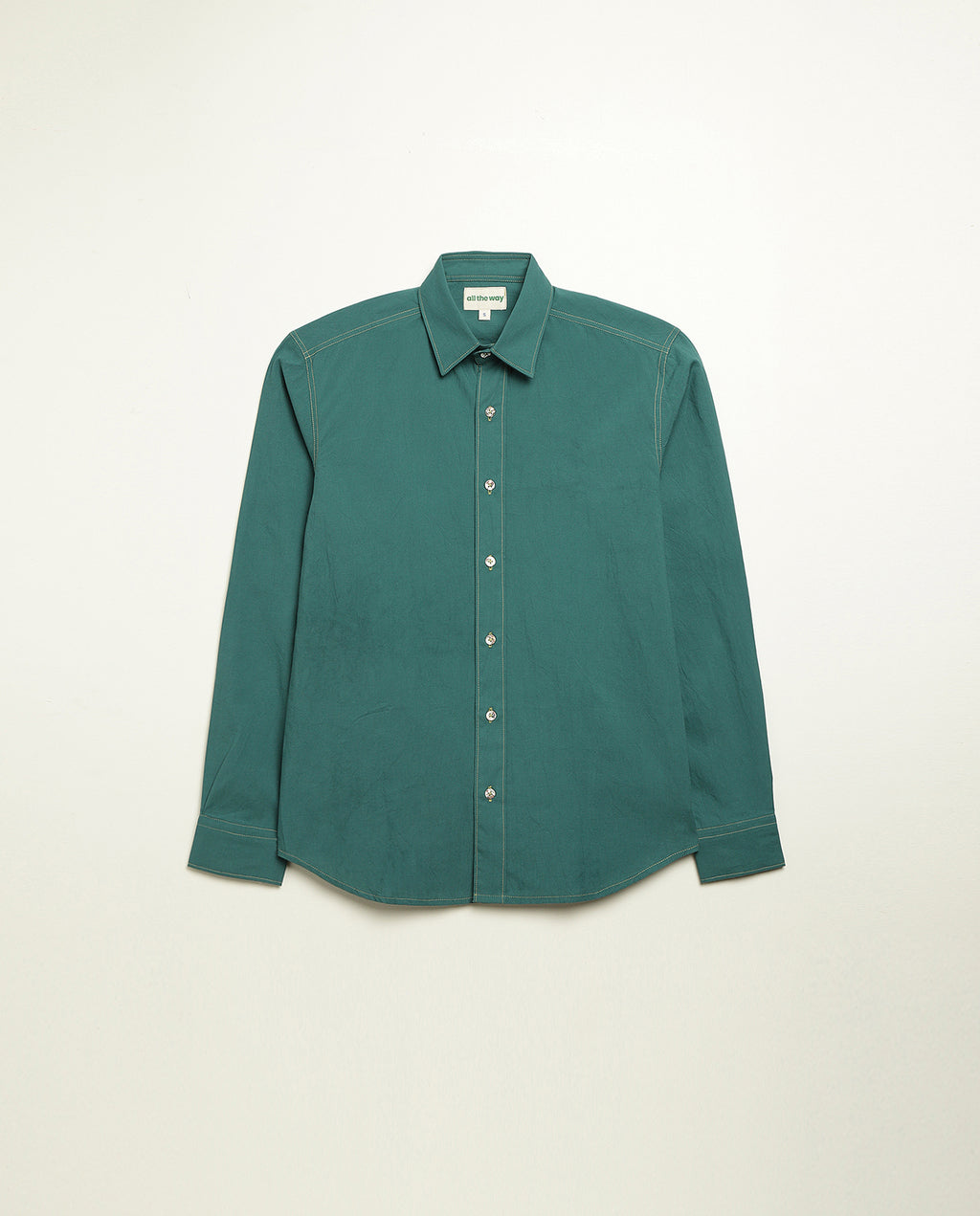 Organic cotton shirt naturally dyed in old forest green, front view, midweight
