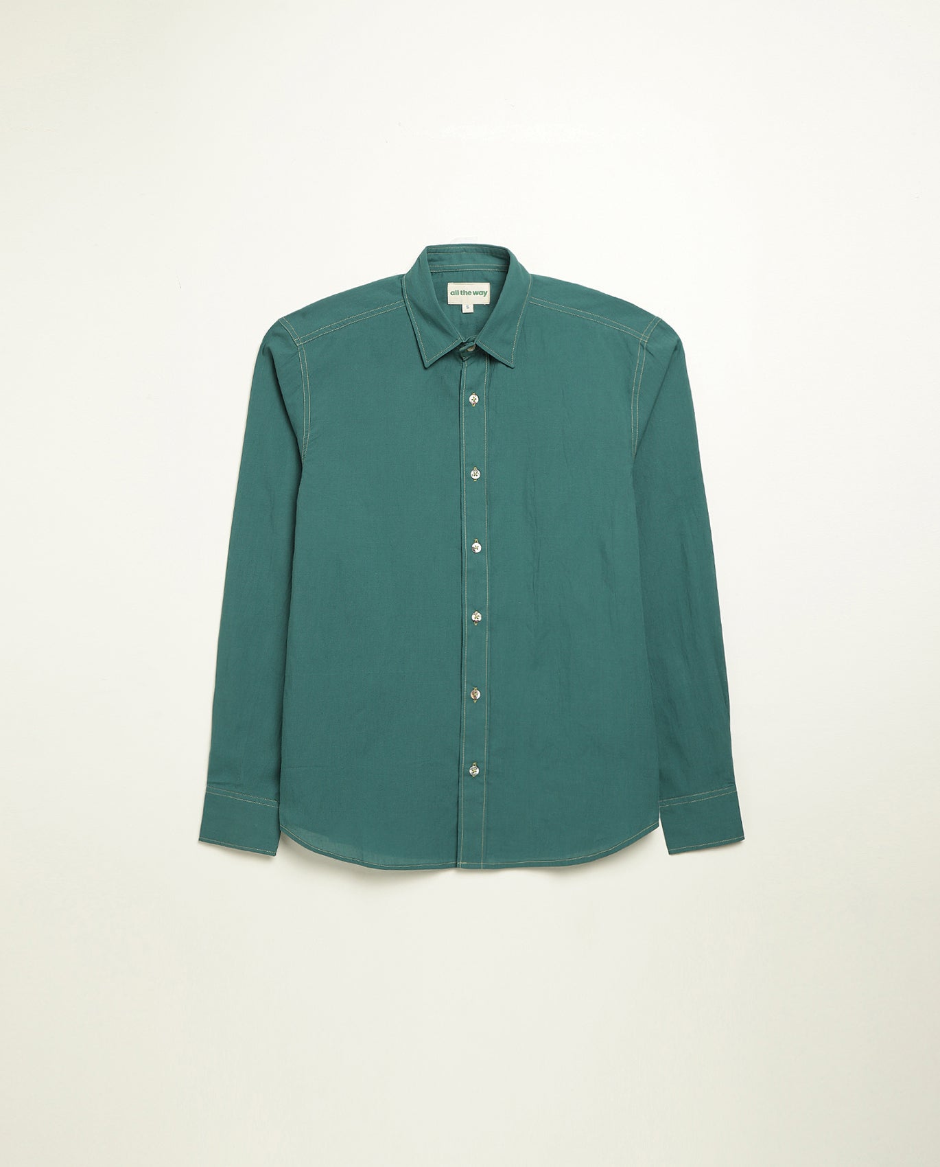 Organic cotton shirt naturally dyed in old forest green, front view, lightweight