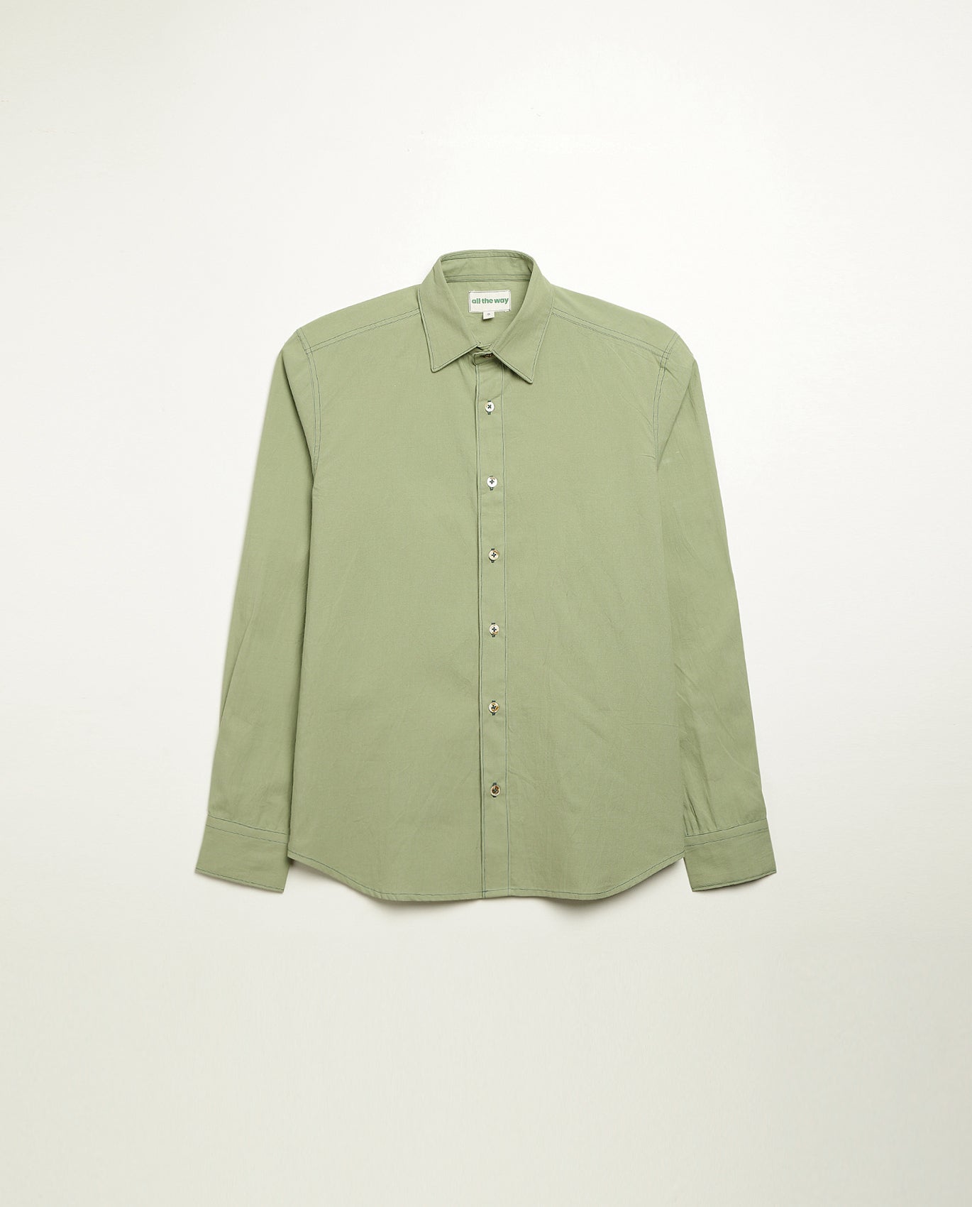 Organic cotton shirt naturally dyed in unripe olive, front view, midweight