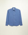 Organic cotton shirt naturally dyed in quiet blue, front view, midweight