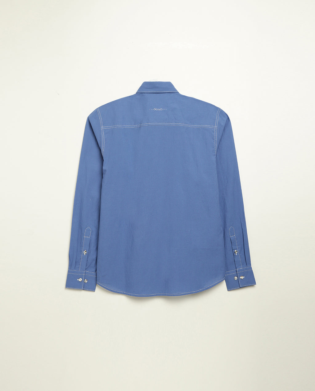 Organic cotton shirt naturally dyed in quiet blue, back view, lightweight